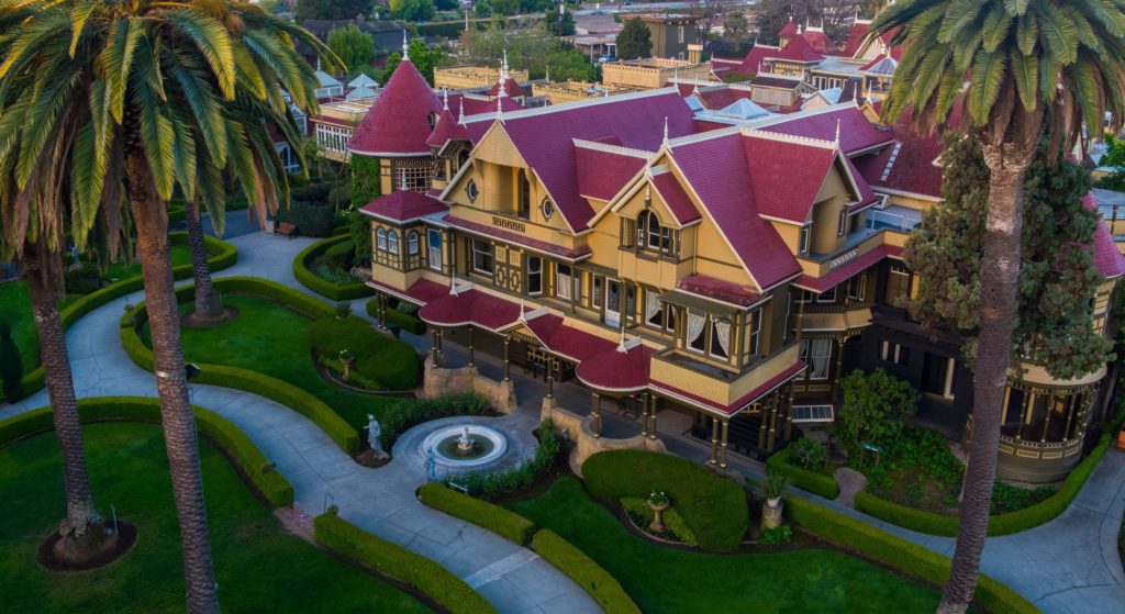 The enigmatic entrance of the Winchester Mystery House invites visitors into its maze of mysteries.