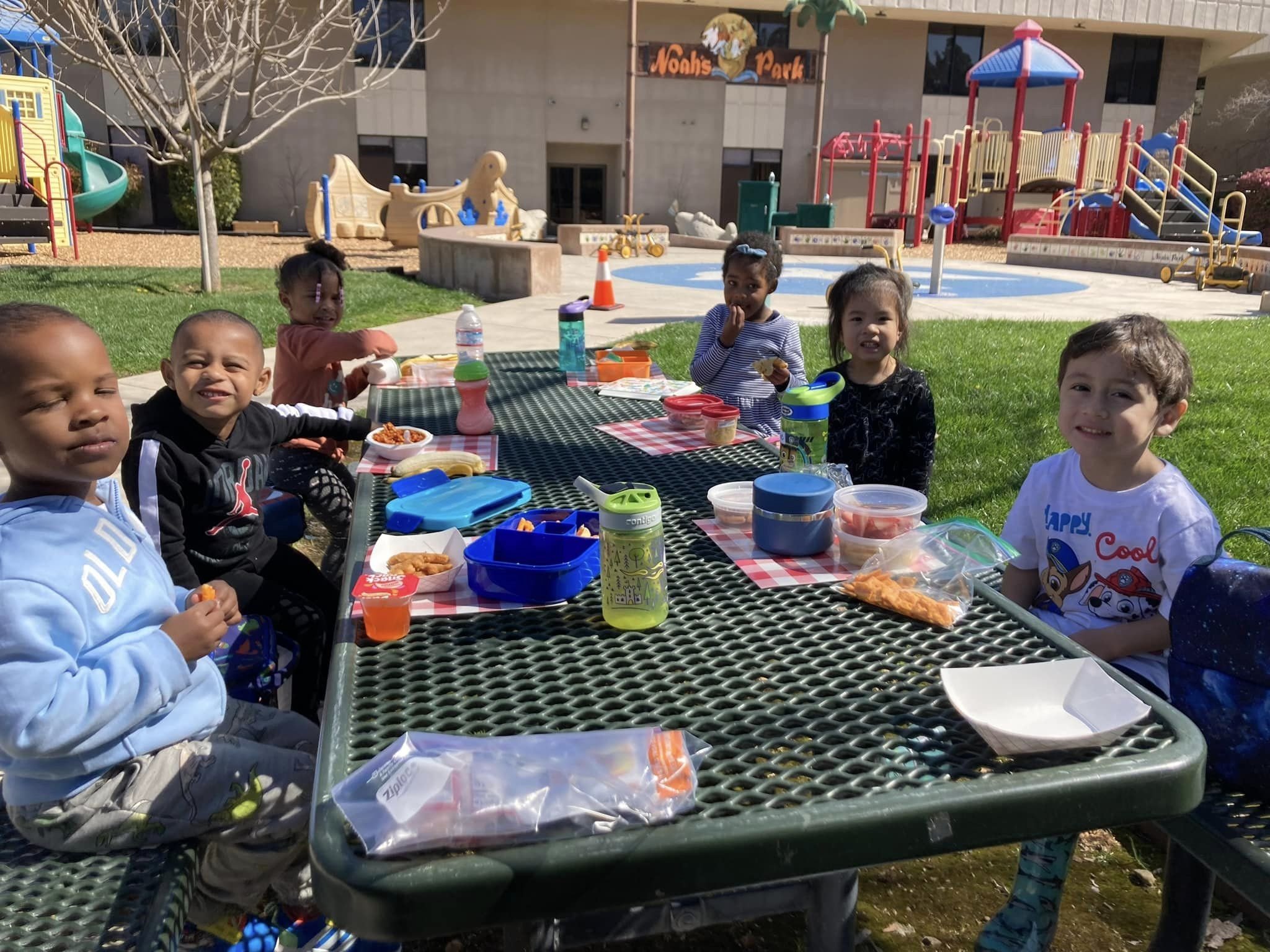 Children enjoying play-based learning activities, embodying our nurturing and supportive environment.